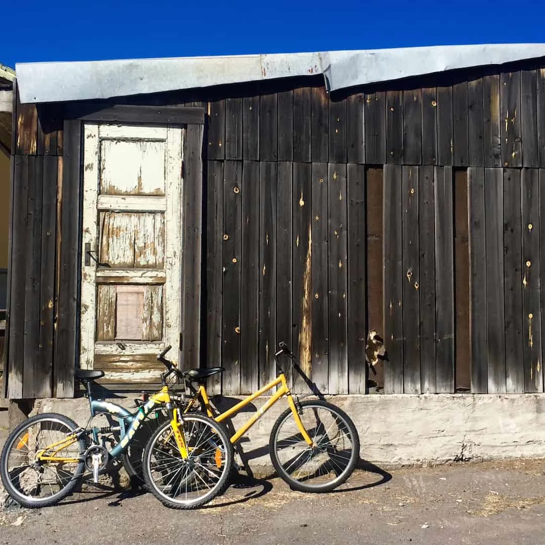 Bikes parked outside a modest building in old Kiruna
