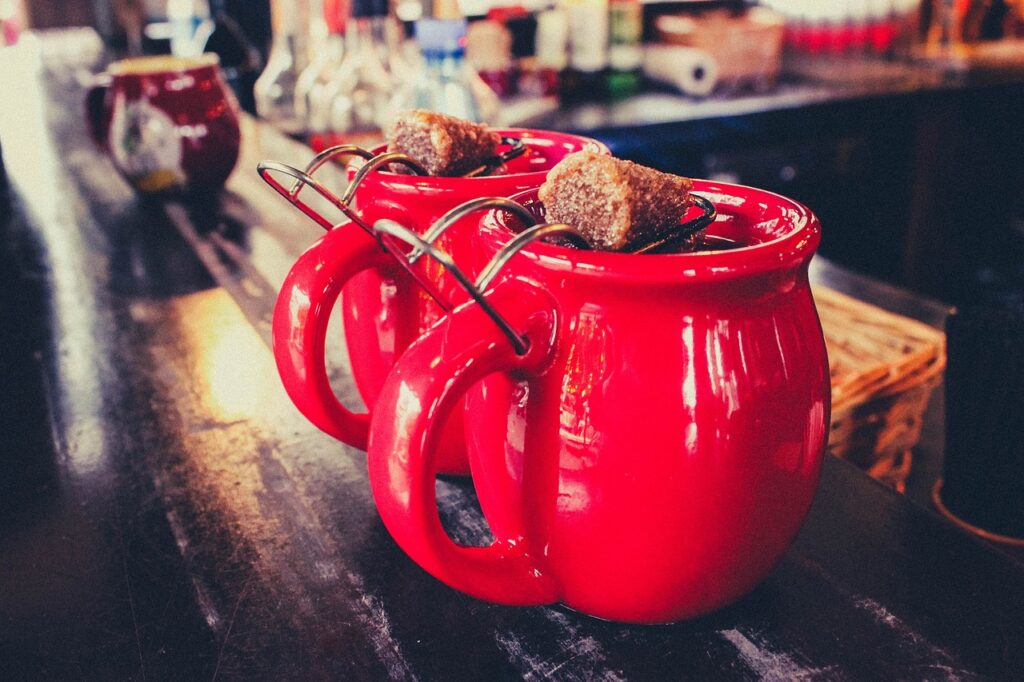 mulled wine in red mugs