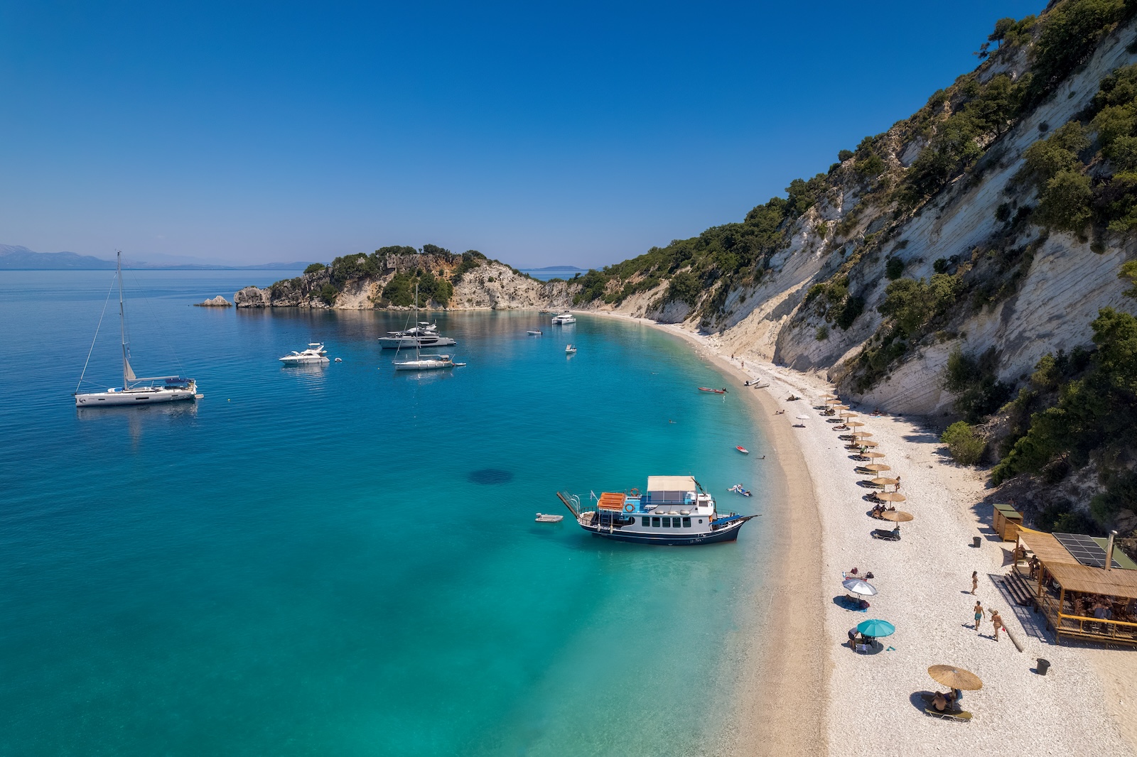 Aerial photo of the paradise beach of Gidaki in Ithaca, the beautiful Ionian island of Greece.