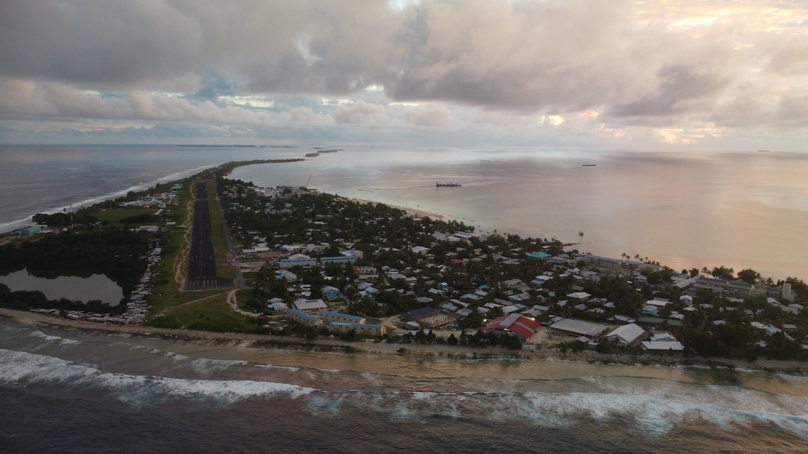 Sunset and airstrip in the smallest country, Tuvalu.