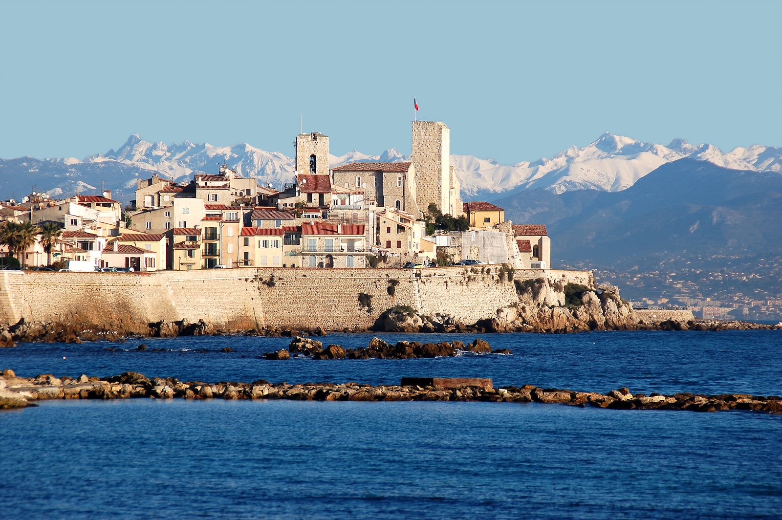 Antibes, old town, French Riviera. The tower with the flag is the first museum in the world to be dedicated to the artist Pablo Picasso.