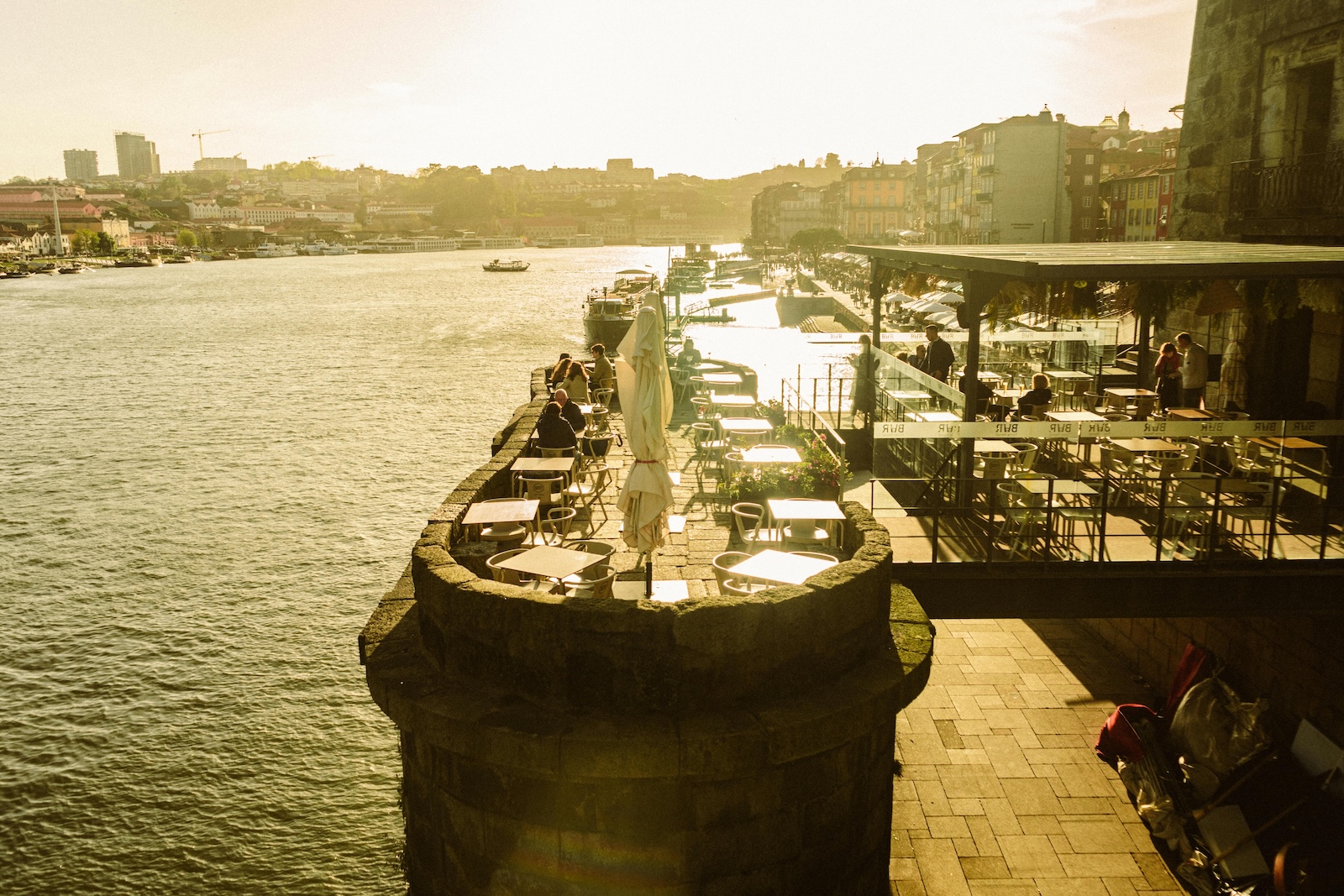 Restaurant on Promenade in Porto at Sunset