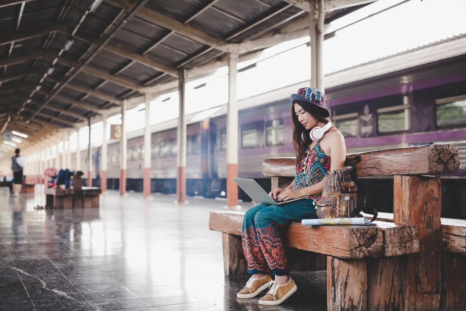 woman holding map train station tourism concept 1